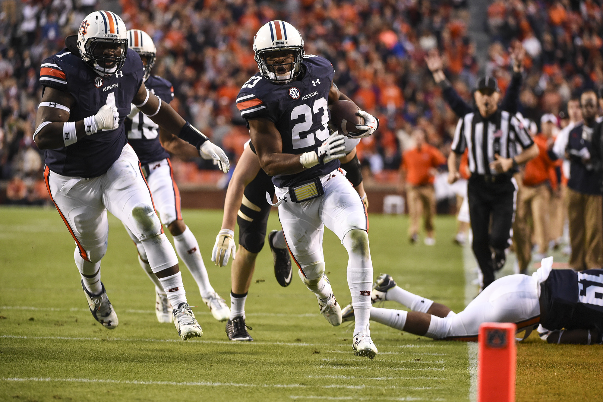 Jonathan Ford (23) returns an interception for a touchdown. Idaho vs Auburn in Auburn, Ala. on Saturday, Nov. 21, 2015. Zach Bland/Auburn Athletics