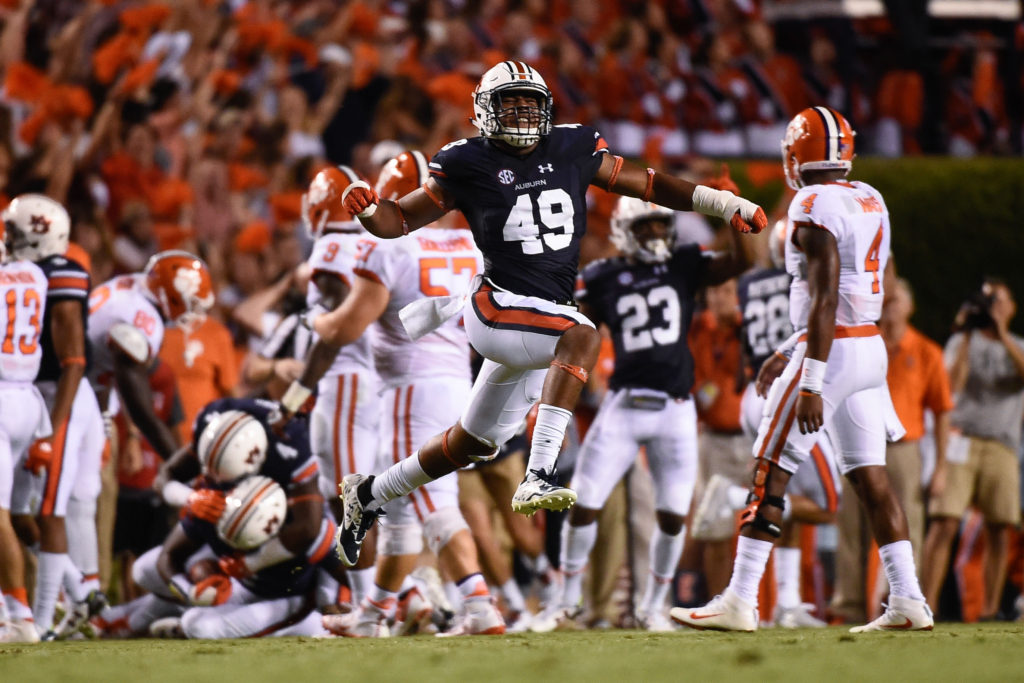 Darrell Williams (49) celebrates after a tackle. Auburn football vs Clemson at Jordan-Hare Stadium on Saturday, Sept. 3, 2016 in Auburn, Ala. Dakota Sumpter/Auburn Athletics